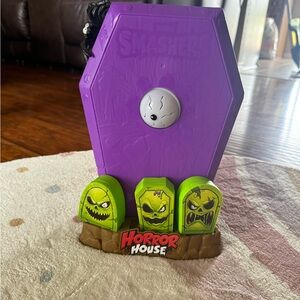 Purple Coffin Toy with Green Monster Details